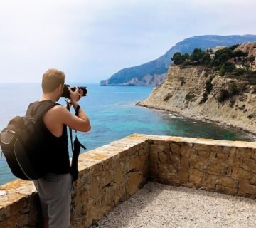 Photographer taking picture ocean coast 657883 287 360x320